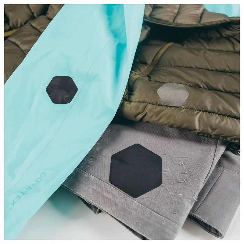 Load image into Gallery viewer, Gear Aid Tenacious Hex Patch - Black: Durable Repair Solution for Outdoor Gear
