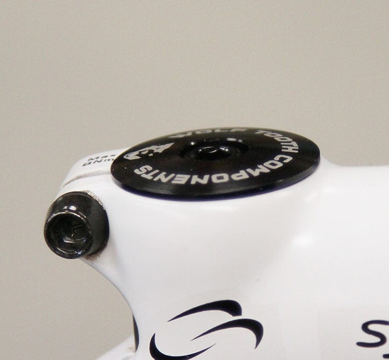 Load image into Gallery viewer, Wolf Tooth Ultralight 7075 Aluminum Stem Cap &amp; Bolt - Raw Silver
